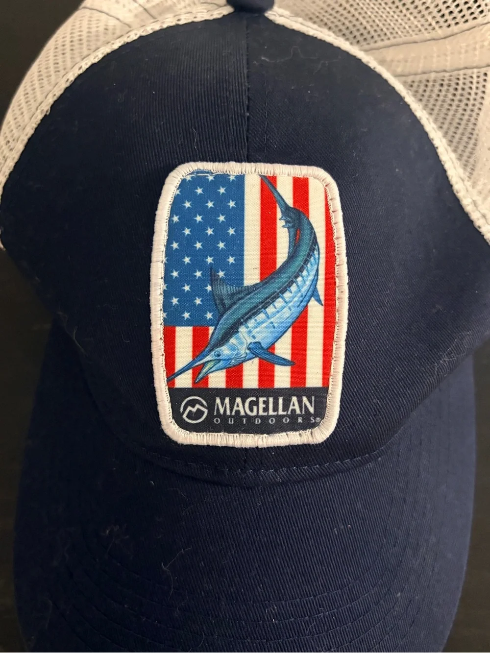 Magellan Outdoors Navy and White Trucker Hat with Marlin Patch